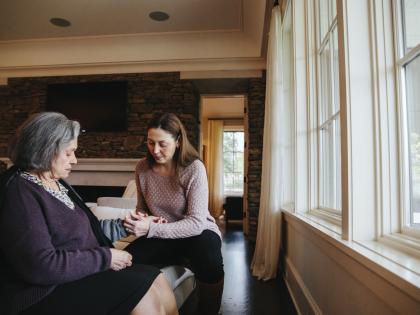 An image of a Family Caregiver Checking Pulse