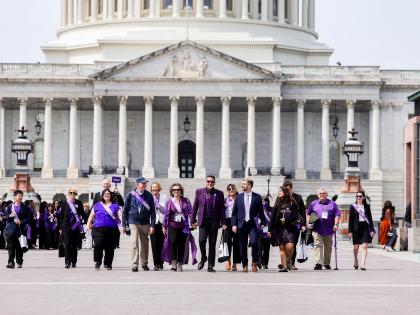 Group walking from Capitol